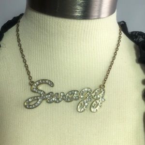 “Swagg” gold tone and rhinestone necklace 20”